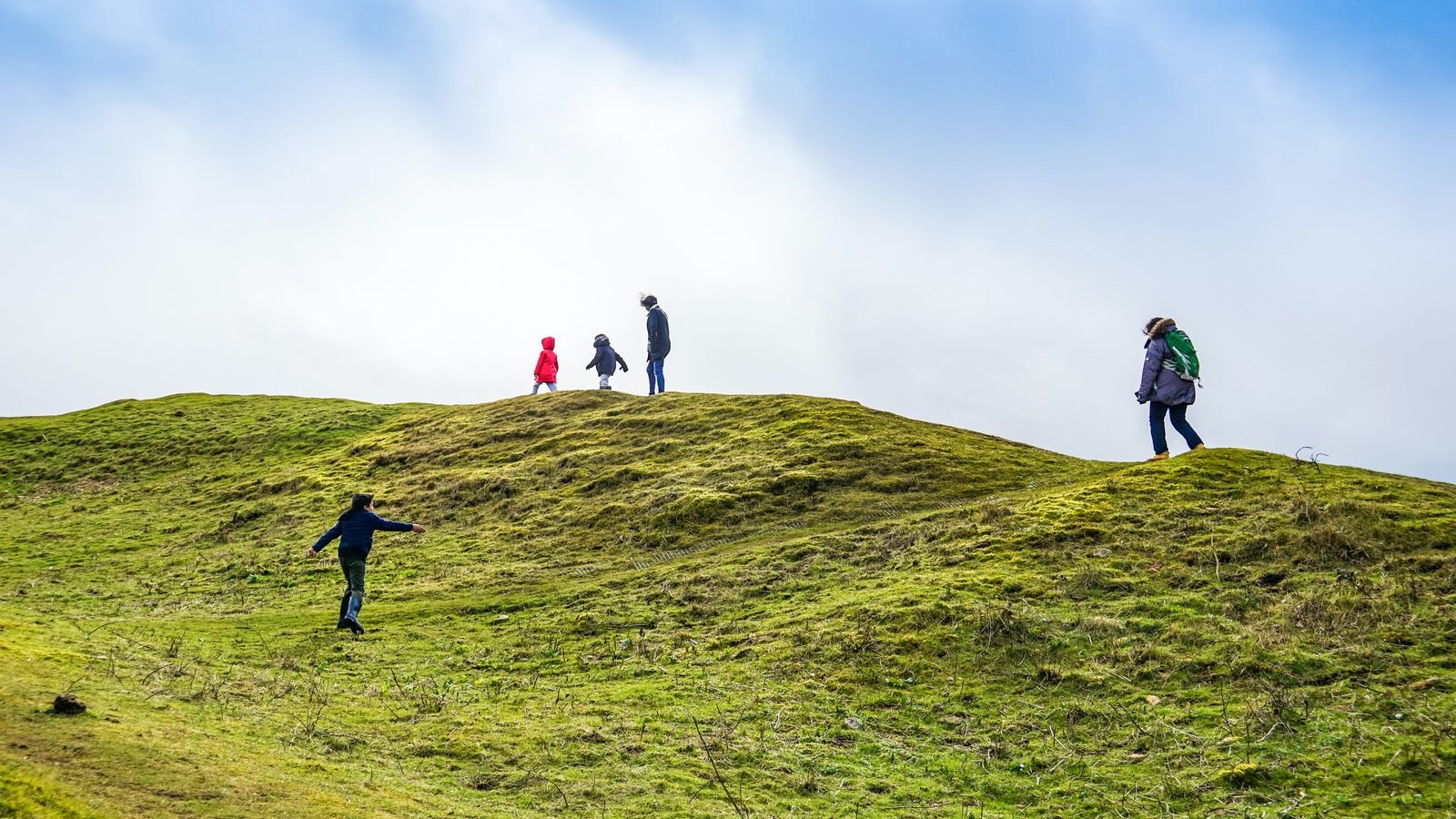 several people on mountain top