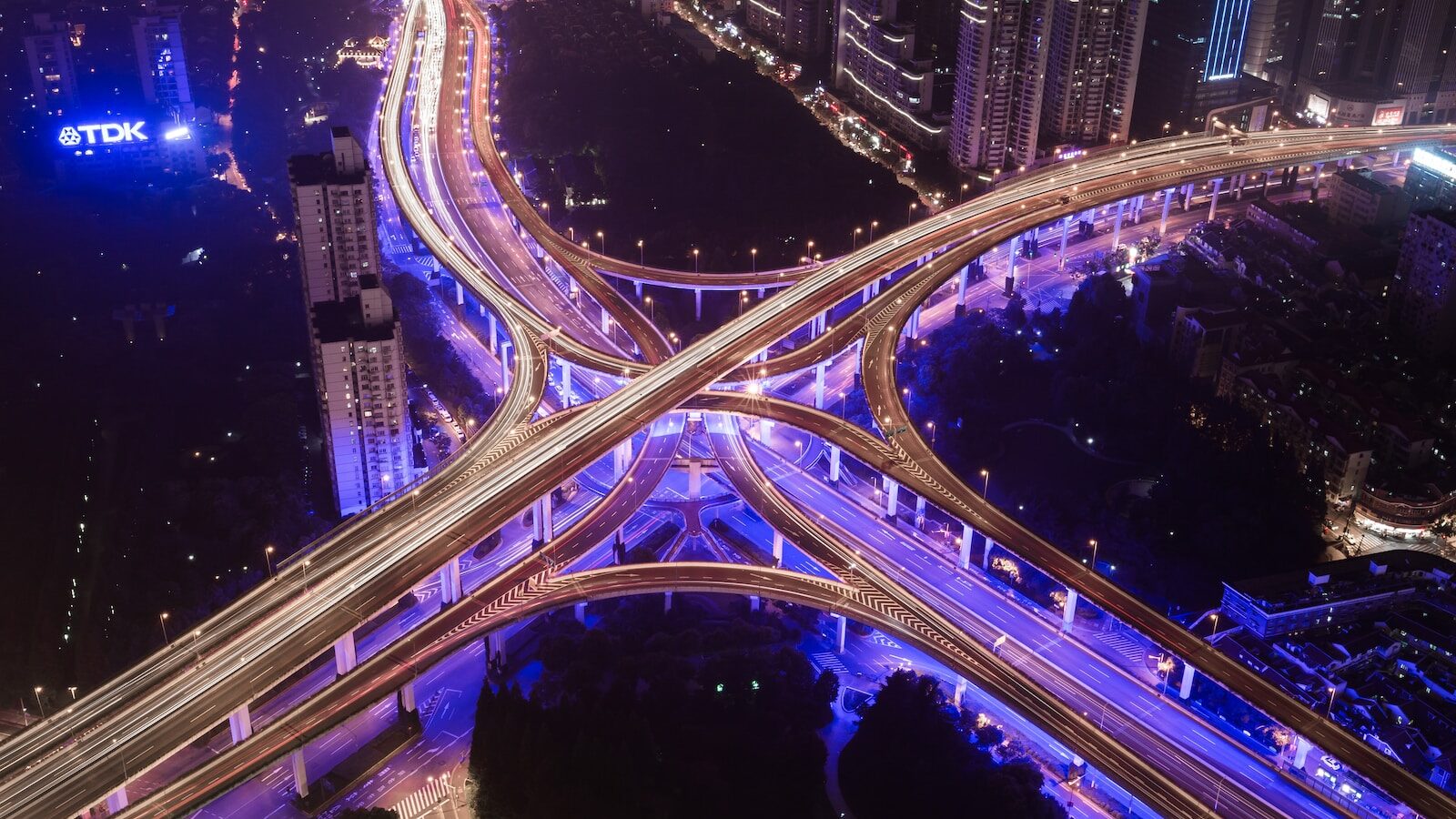 aerial photography of bridge near buildings