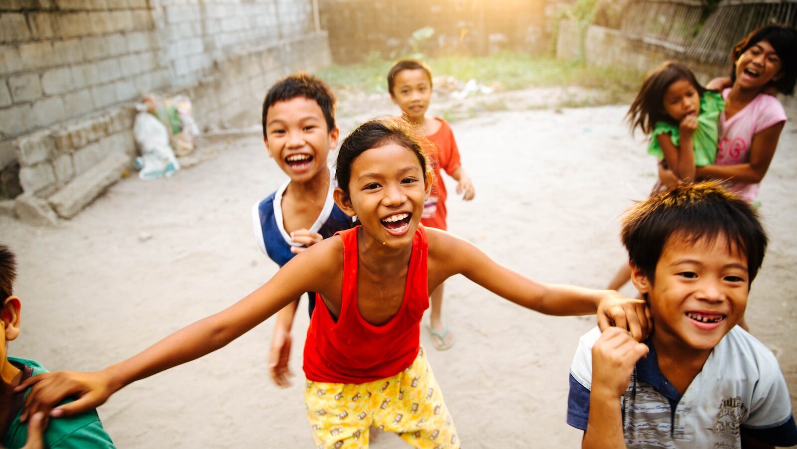 group of children laughing together